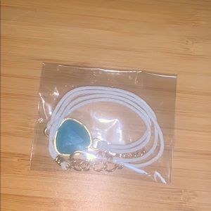 Unopened NEVER USED white bracelet